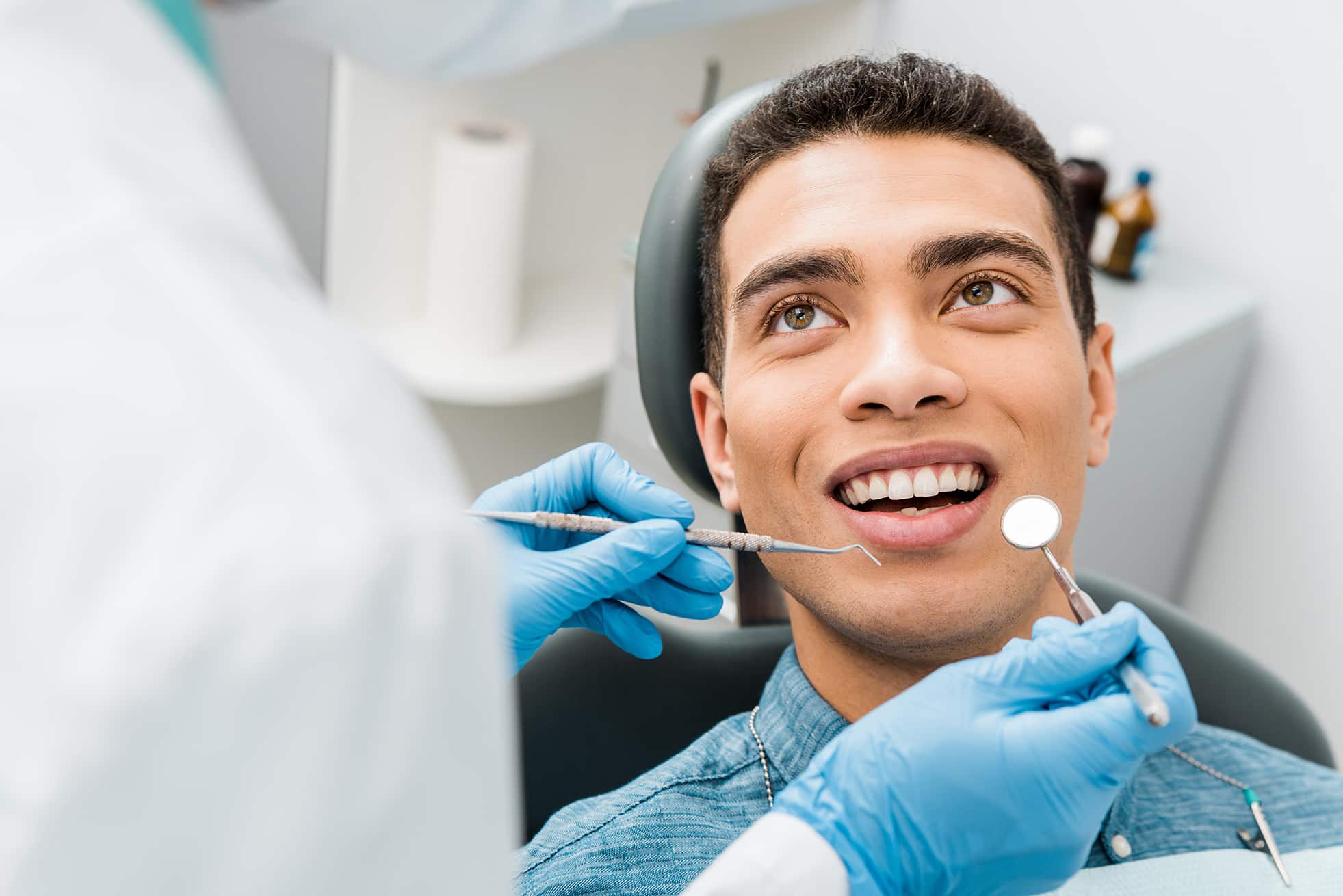 man during teeth exam in st johns florida