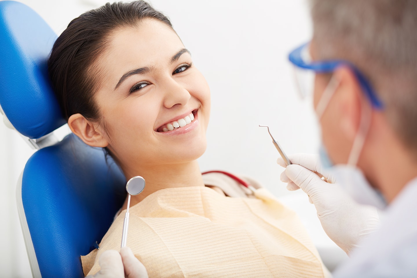 woman during dental exam at Vivere Meliora Dentistry