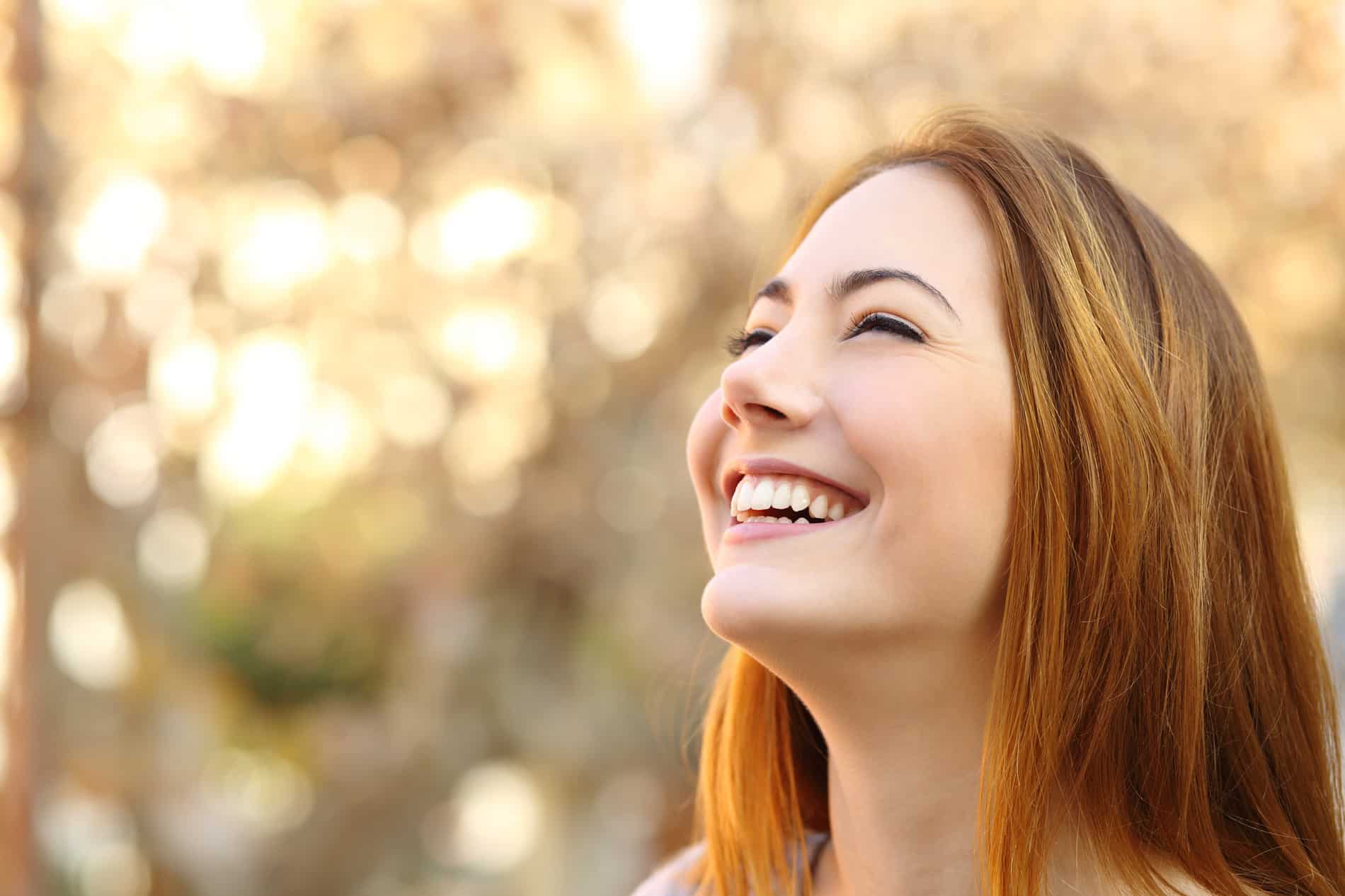 Happy woman after dental reconstruction in ST. Johns FL