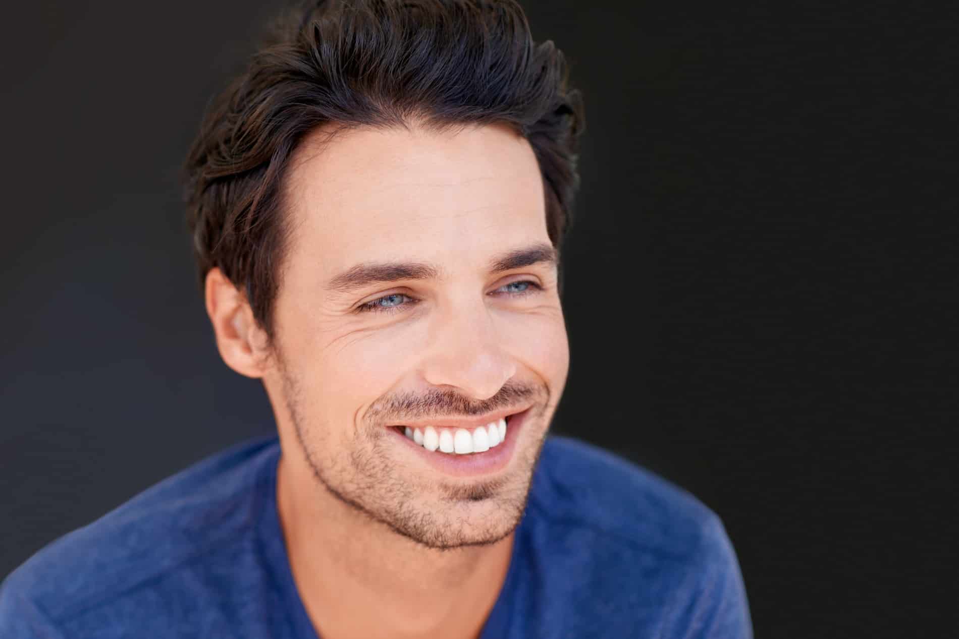 Man smiling with perfect teeth after tooth reshaping in St Johns FL